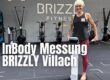Coach Chris bei der InBody Messung mit einem Mitglied bei BRIZZLY in Villach